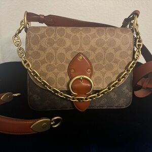 Coach Brown and Tan Crossbody Bag with Monogram Pattern and Gold Tone Hardware